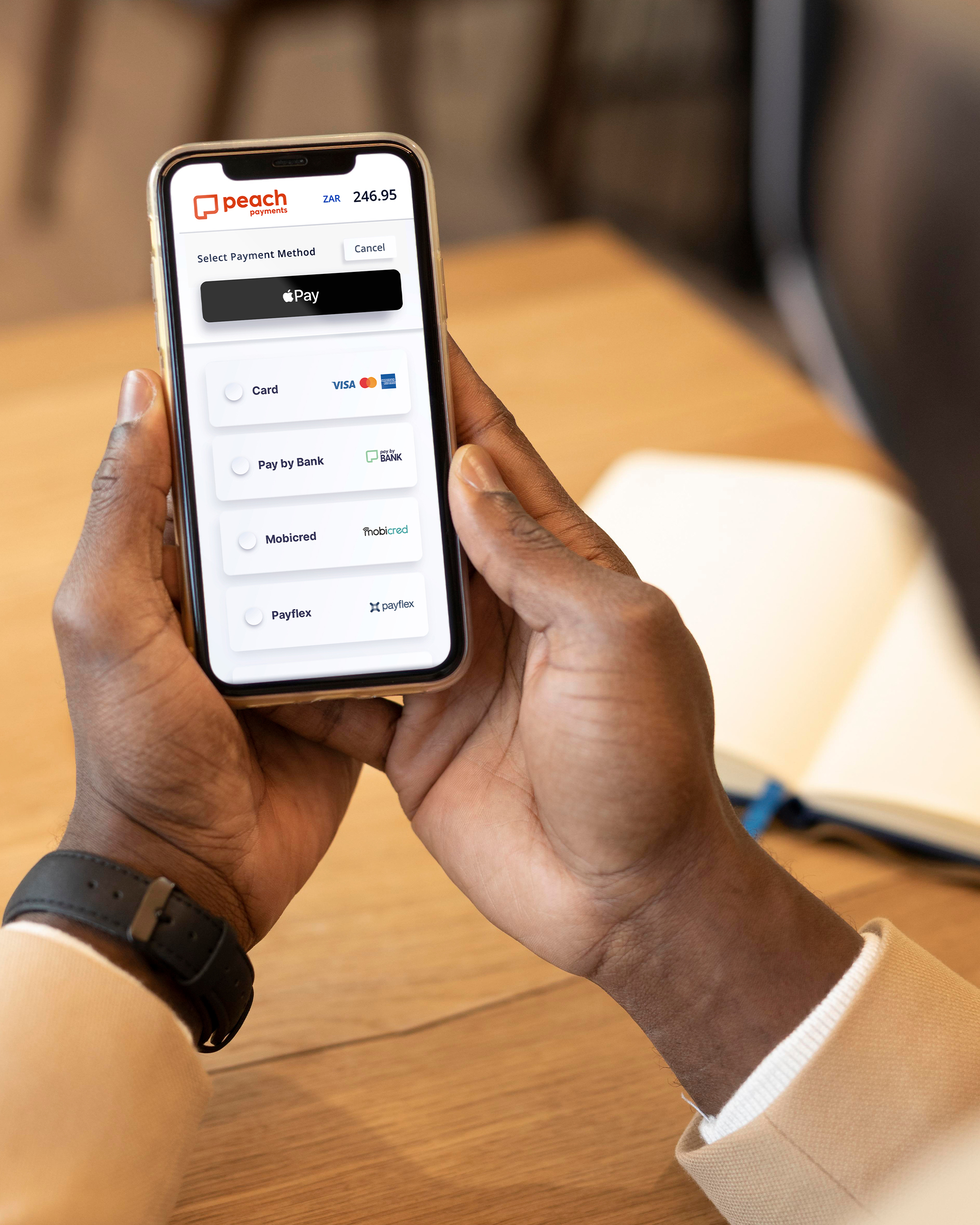 Peach Payments Checkout - Mobile In Hand Image